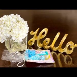 BBS: A bracelet and lipgloss with bath foam, string, candy and a scrunchie!<3